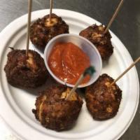 Crab Balls · 5 fried balls served wth cocktail sauce.