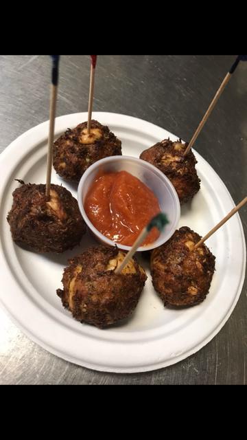 Crab Balls · 5 fried balls served wth cocktail sauce.