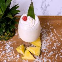  Caribbean Dream Piña Colada  · Blended frozen drink with Coconut and Pineapple