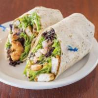 Grilled Po Boy Shrimp Wrap · Classic shrimp po boy. Six ounces of grilled shrimp wrapped in a sun dried tomato wrap with ...
