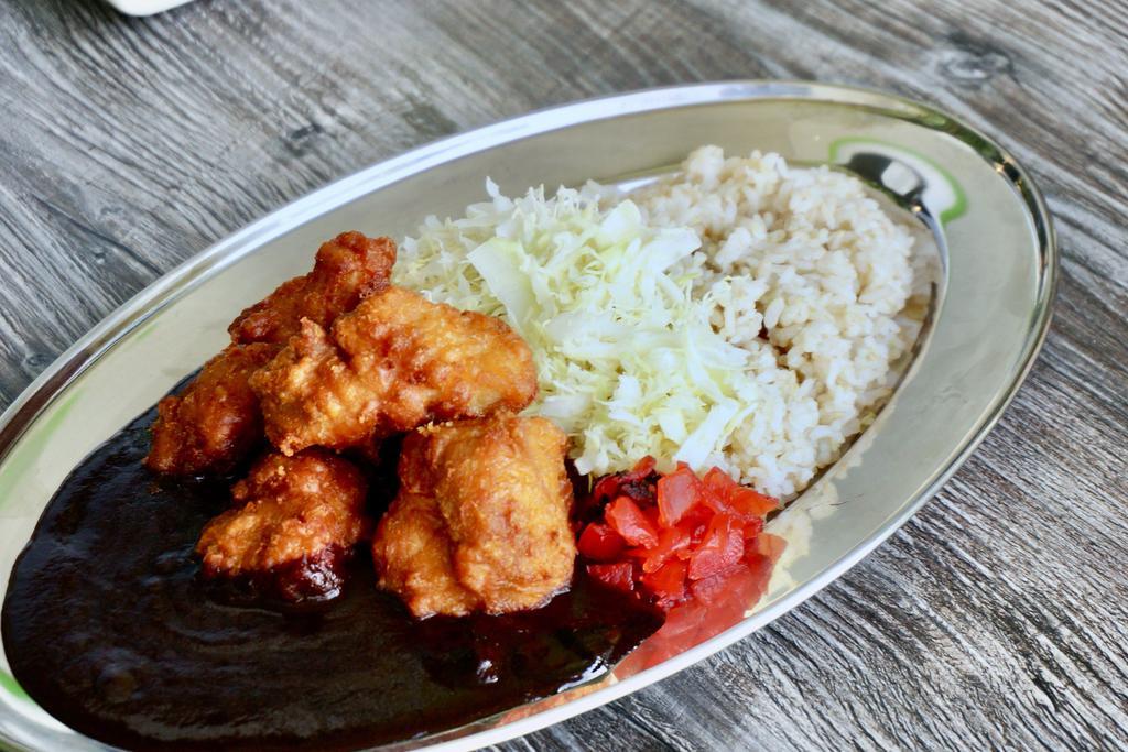 Chicken Karaage Curry · Chicken Karaage served with shredded cabbage, Fukujin-pickles and 50% milled brown rice