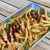 Soboro Fries · French fries covered with soboro (ginger braised beef) drizzled with our house spicy mayo sa...