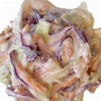 Wasabi Slaw  · Crunchy cabbage and carrot dressed in creamy dressing with wasabi. Gluten free.