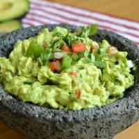 Fresh Guacamole  · Homemade fresh guacamole served with chips.