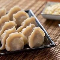 Shrimp Dumpling with Green Chives韭菜虾仁水饺 · Stuffed dough. 