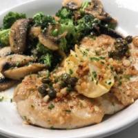 Chicken Picatta · Chicken breast smothered in a tangy white wine butter sauce, lemon juice studded with capers...