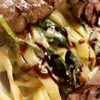 Steak Gorgonzola · Steak, served on a bed of fettuccine in a creamy garlic sauce with gorgonzola and spinach
-S...