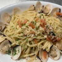Linguine Clams (Dinner) · Linguine pasta with manila clams in a white wine garlic sauce and tomato blend