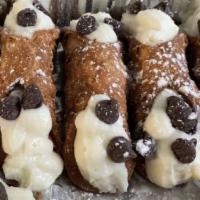 Cannolis · 3 mini Tube-shaped shells deep fried pastry, filled with a slightly sweet and creamy vanilla...