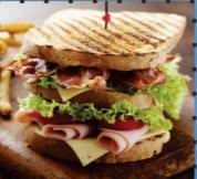 Turkey Swiss Sandwich · Served with lettuce, tomatoes, and mayo.