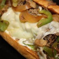 Philly Steak & Cheese Sub · Comes with green peppers, onions and mushrooms. Made with ribeye steak.