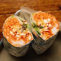 Burrito · With kimchi fried rice, lettuce, cheese, carrots, green onions, sour cream, and Seoul sauces...