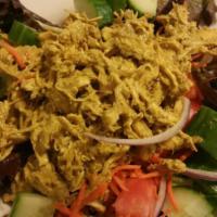 Curry Chicken Salad · On spring mix with tomatoes, cucumbers, carrots, mushrooms and red onion, with our homemade ...