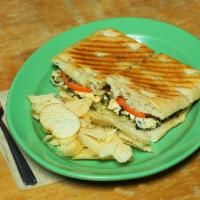 Caprese Panini · Thickly sliced mozzarella, tomatoes with fresh homemade pesto and on grilled focaccia.
