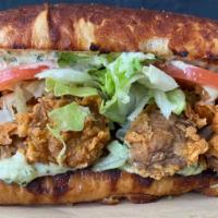 Ain’t Gator Po’Boy · House-made seitan and mushrooms battered and dressed with onions, lettuce, tomatoes, pickles...