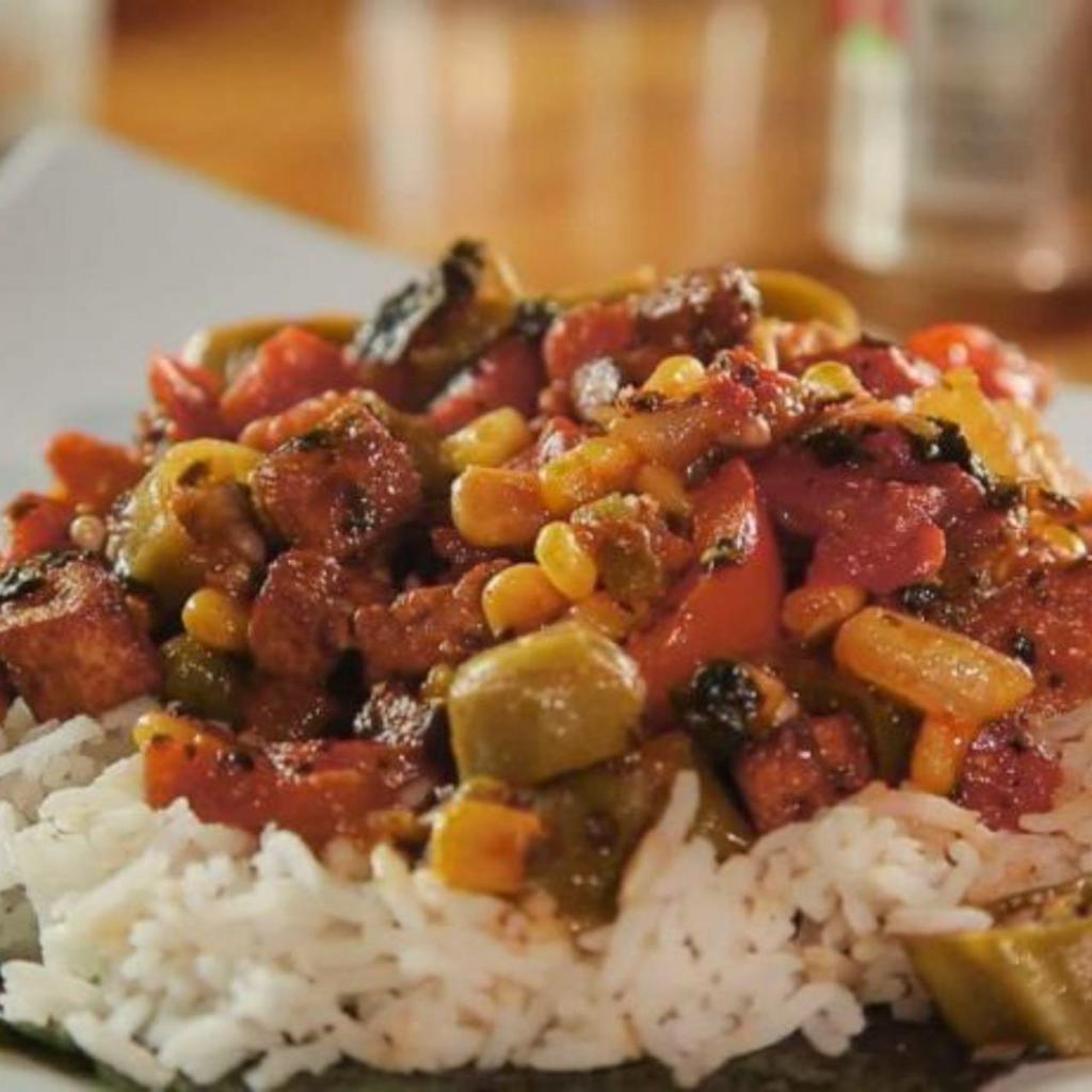 Okra Gumbo · Okra stars in this Louisiana staple, flavored with garlic, corn, tomatoes, seaweed, our special mix of creole spices, and the holy trinity, celery, onions and bell peppers. Served with brown rice.