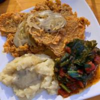 Seitan Steak Plate · House-made seitan-steaks served with our savory gravy, sauteed onions, greens and creamy mas...