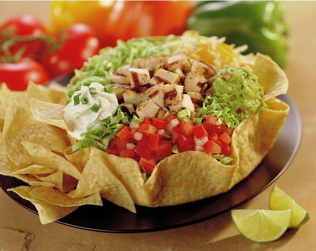 Taco Salad · Romaine lettuce, rice, beans, fresh salsa, guacamole, cheese and sour cream in a crisp tortilla shell. 