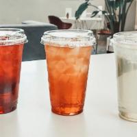 Iced Tea · Choose from a variety of specialty teas, brewed and poured over ice, by the cup.