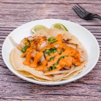 Shrimp Tacos · Grilled shrimps and onions, cilantro and creamy special sauce.