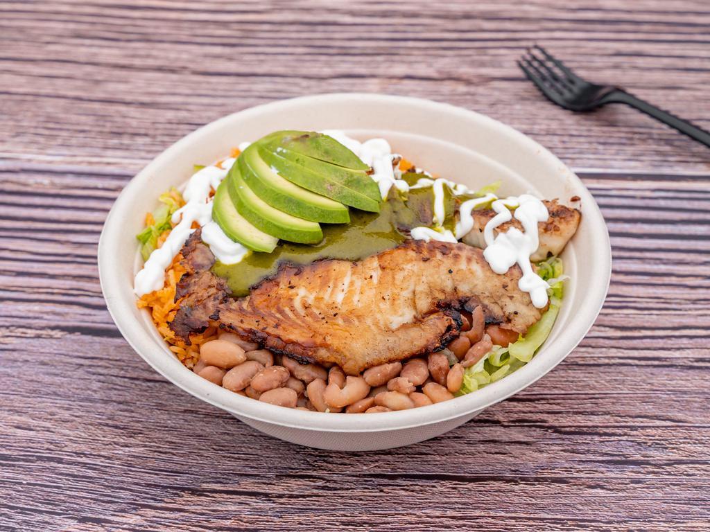 Fish Bowl · Served with rice, beans, lettuce, guacamole, sour cream, onions, cilantro and topped with cilantro vinaigrette over grill fish fillet.