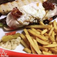 Chivito Uruguayo Steak Sandwich · With french fries.