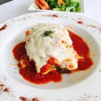 Beef Lasagna · Served with a house salad.