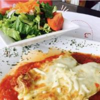 Cannelloni Spinach and Cheese · Served with a house salad.