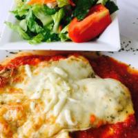 Cannelloni Ham and Cheese · Served with a house salad.