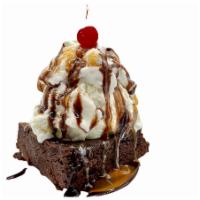 Hot Brownie Sundae · Warm fudge brownie topped with your favorite ice cream and whipped cream and drizzled with c...