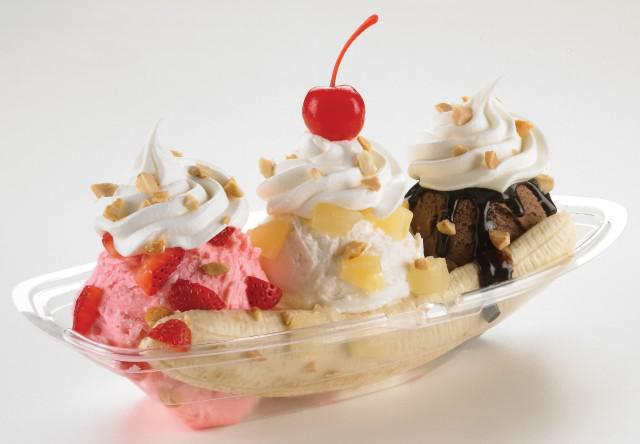 Banana Split · Sweet cream, chocolate, and strawberry ice cream with a banana on bottom. Served with pineapple, strawberry, whipped cream, peanuts, and a cherry on top.