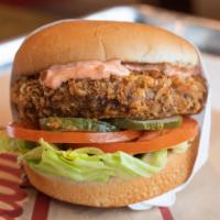 Juicy Lucy Burger · American cheese stuffed panko fried beef and onion patty, house-made pickles, lettuce, tomat...