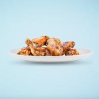 Holy Wings · Bone-in traditional chicken wings in your choice of wing sauce.
