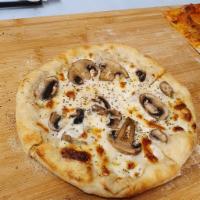Nostra Bianca Pizza · White sauce, fresh mozzarella, mushrooms.