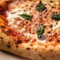 Margherita Pizza · Tomato sauce, fresh mozzarella, basil.