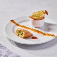 Classic Northern Samosas (VG) by dosa by DOSA · By dosa by DOSA. 2 pieces. Savory Indian pastries made with spiced potatoes, green peas, gin...