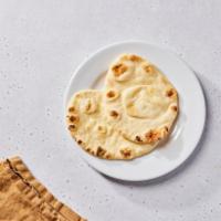Naan (V) by dosa by DOSA · By dosa by DOSA. Indian flatbread, cooked tandoori style...the perfect companion to every cu...