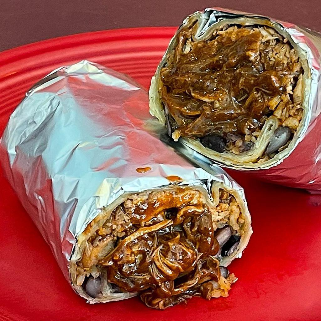 Mission Chicken Mole Burrito · Our house made mole sauce with chicken, black beans, spanish rice and salsa fresca. Contains gluten, tree nuts, soy, and nightshades. We cannot make substitutions.