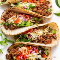 Taco · Choice of meat. Hard, soft or keto shells for an additional charge. Comes with lettuce, toma...