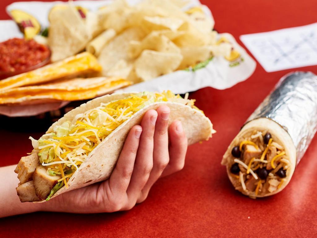 Kids Power Wagon Taco · Our kid-sized hard or soft taco is served with your choice of adobo chicken or ground beef, shredded cheese and lettuce. Plus every kids' meal includes a cookie, a kid-sized drink and free chips and salsa!