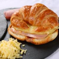 Ham and Cheese Croissant · Plain croissant with ham and cheese. Add-ons for an additional charge. 
