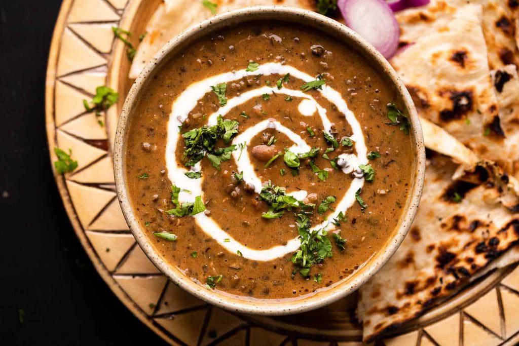 Daal Makhani · Protein rich lentils cooked overnight in a butter based seasoning.