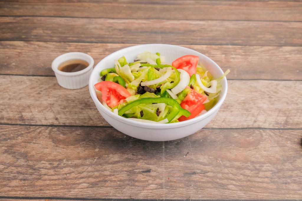 Mixed Greens Salad · Green peppers and black olives.
