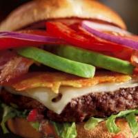 The Madlove Burger · Fall in love with this burger. Provolone and Swiss cheeses over a of gourmet beef patty topp...