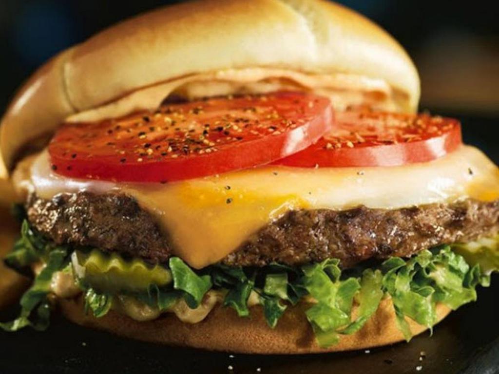 The Master Cheese Burger · Gourmet patty with a duo of melted Cheddar and Provolone cheeses, Bistro Sauce, dill pickle planks, lettuce and tomatoes on a toasted brioche bun.