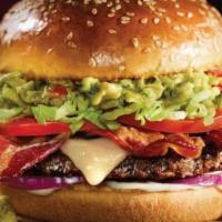 Guacamole Bacon Burger · Guac, bacon, Swiss, tomatoes, lettuce, onion and mayo. No wonder you’ll be grinning after th...