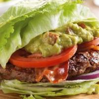 The Wedgie™ Burger · Stacked with bacon, guac, tomato and red onion inside of a lettuce bun, then wrapped for eas...