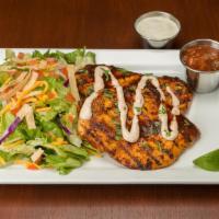 Ensenada Chicken Platter™ · Fire-grilled chicken breasts basted with authentic Mexican seasonings, topped with fresh sal...