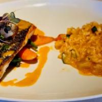 Branzino- Sea Bass · Roasted striped bass, shrimp risotto with lobster  sauce.
