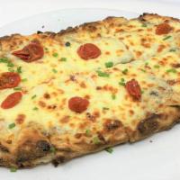 Casati's Bianca Pizza · Truffle shavings, mozzarella, parmesan, chives, sun dried tomatoes 